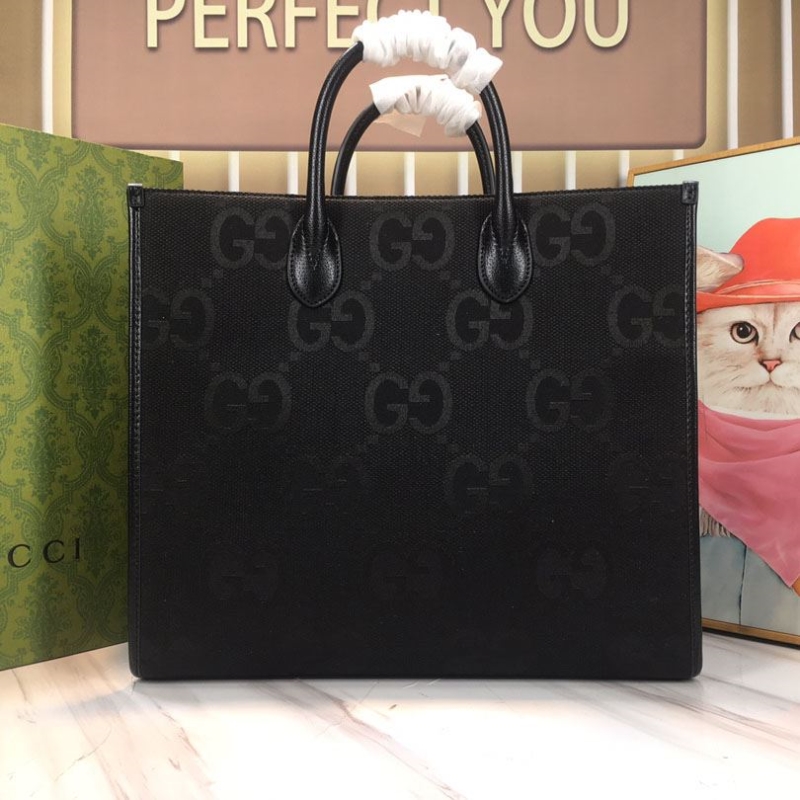 G*u*i shopping bags